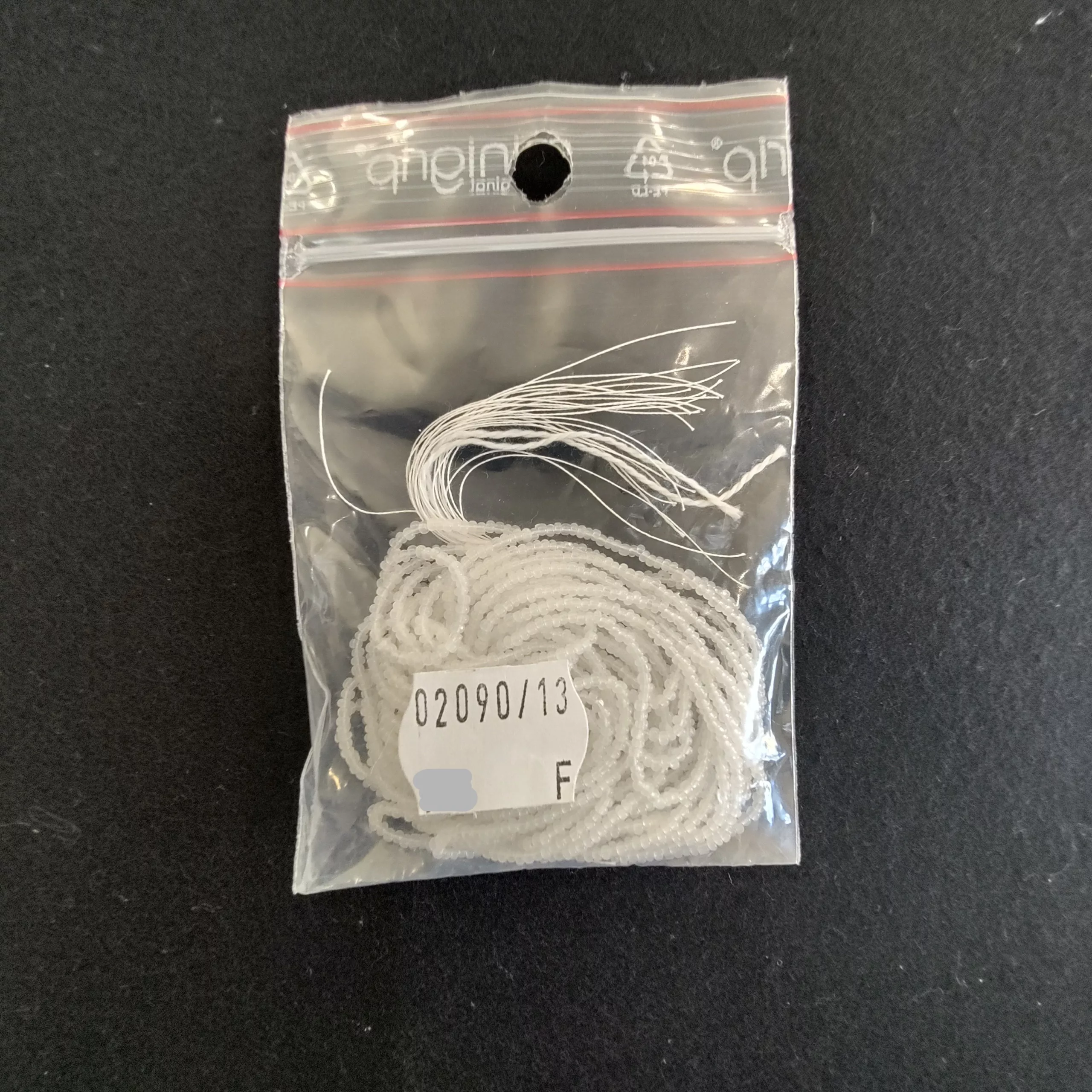 Perles charlottes blanc translucide 02090/13