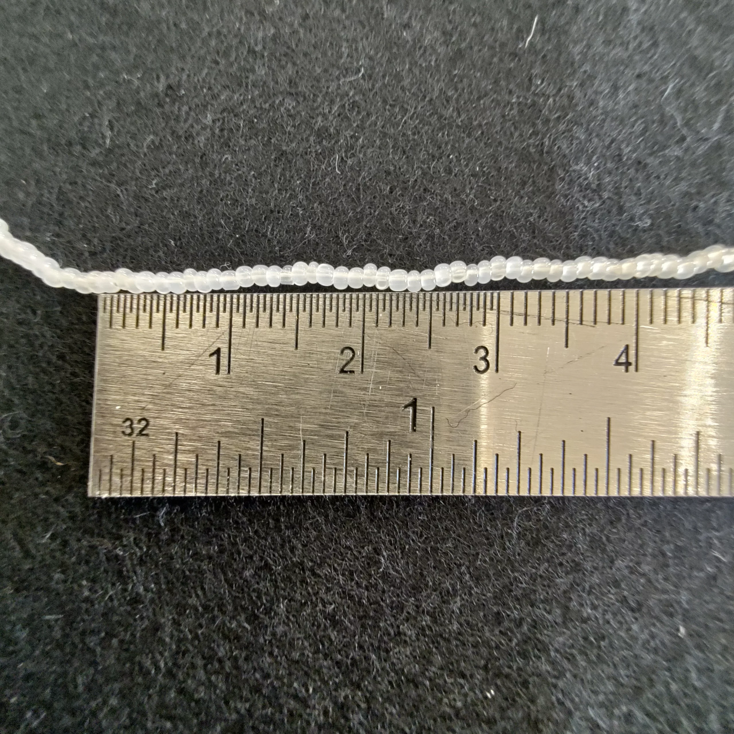 Perles charlottes blanc translucide 02090/13