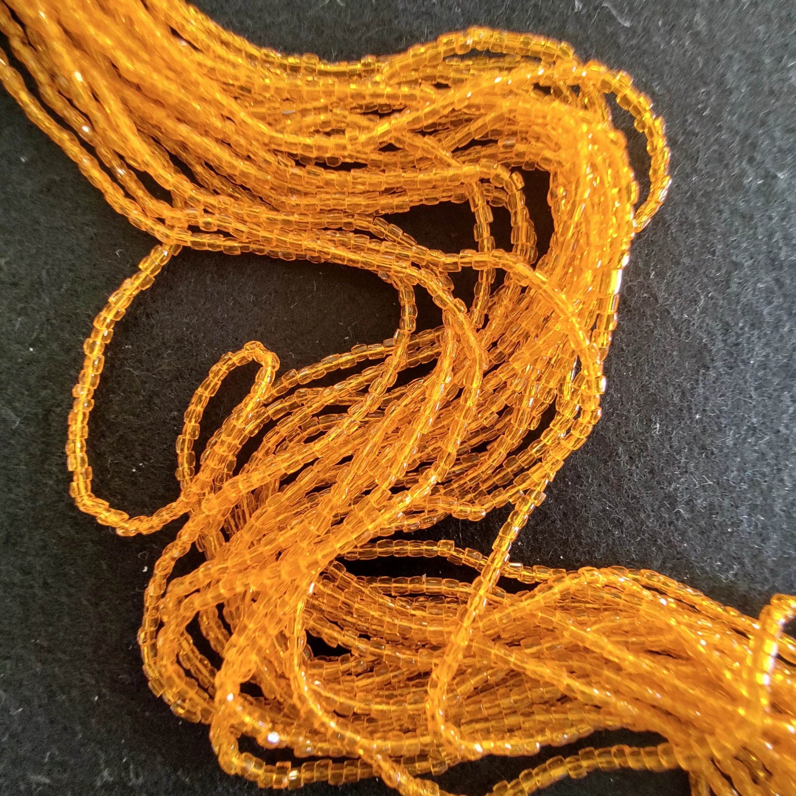 Perles 3 facettes orange translucide 90000/11