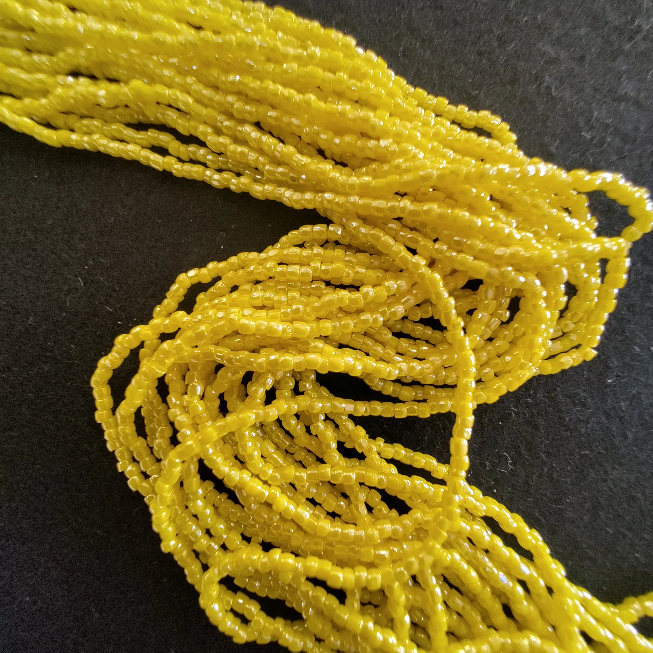 Perles 3 facettes jaune 88130/12