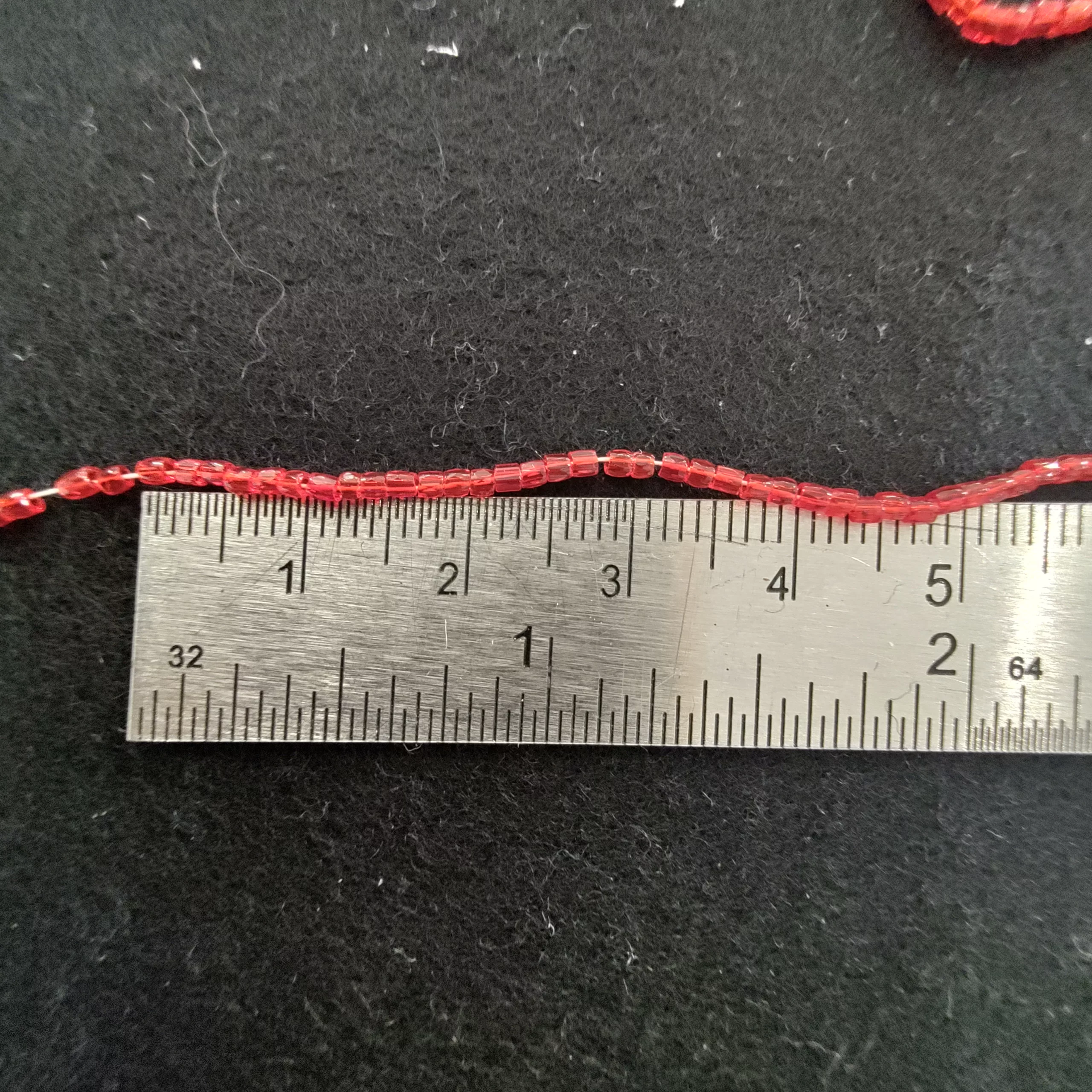 Perles 3 facettes rouge translucide 90070/11