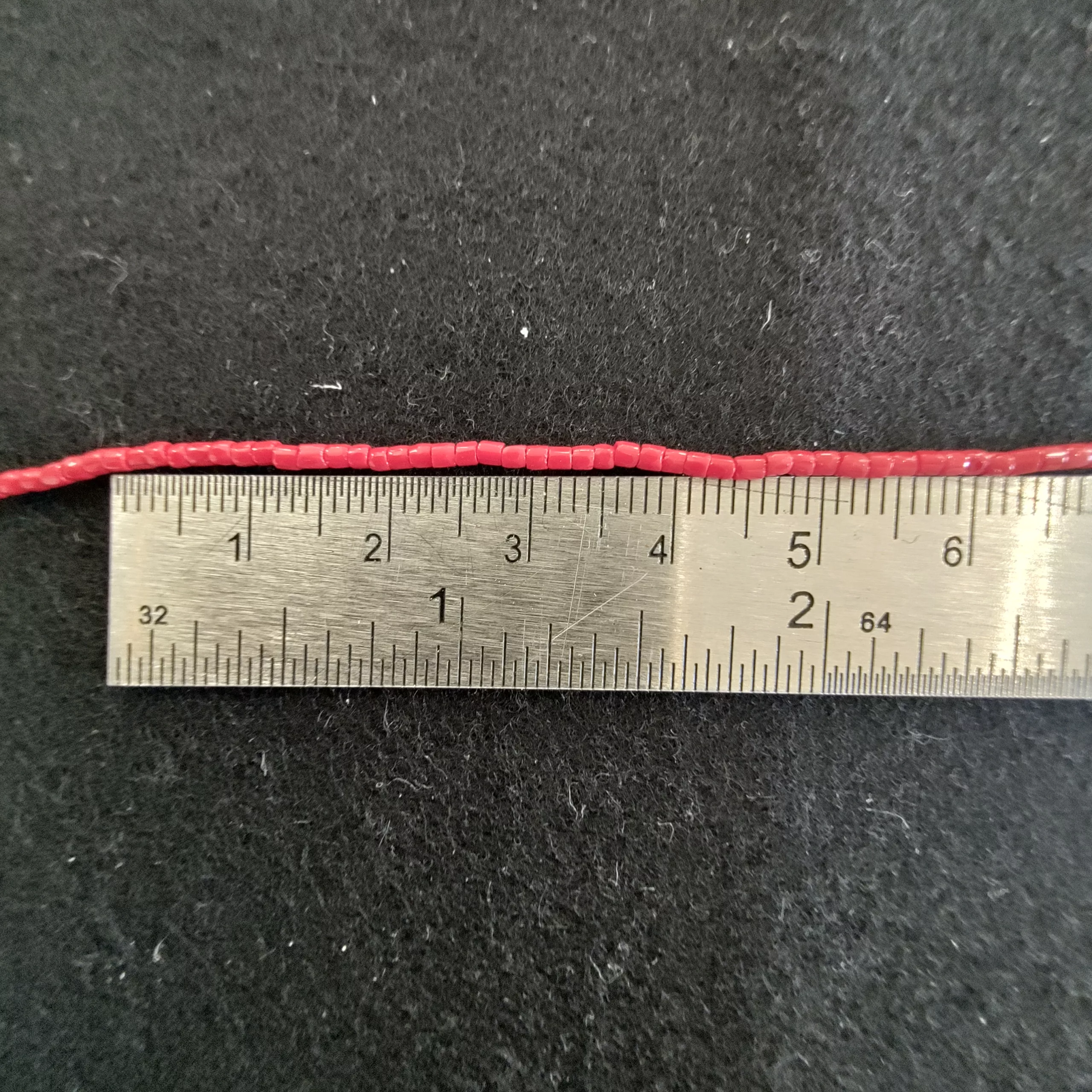 Perles 2 facettes rouge 93190/12