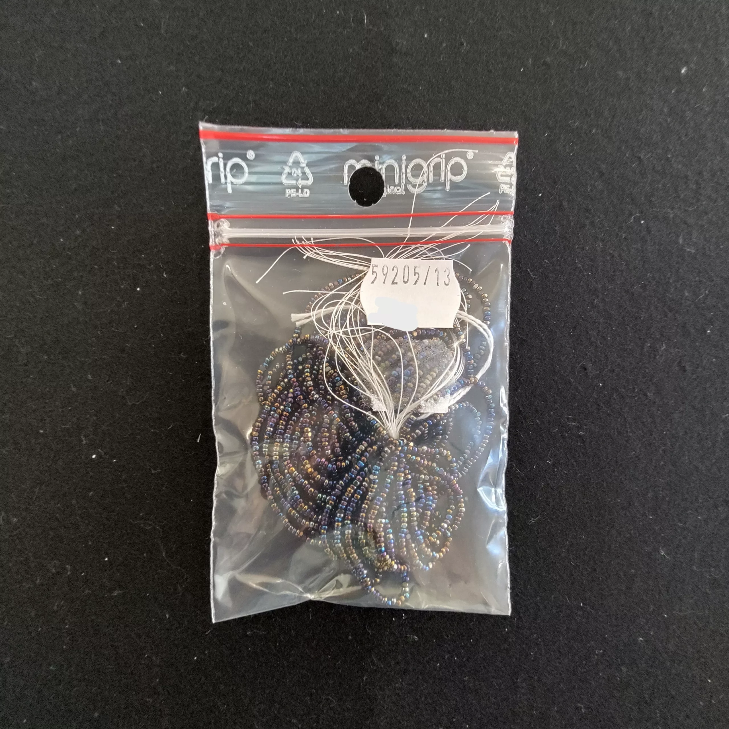 Perles charlotte irisées paon 59205/13