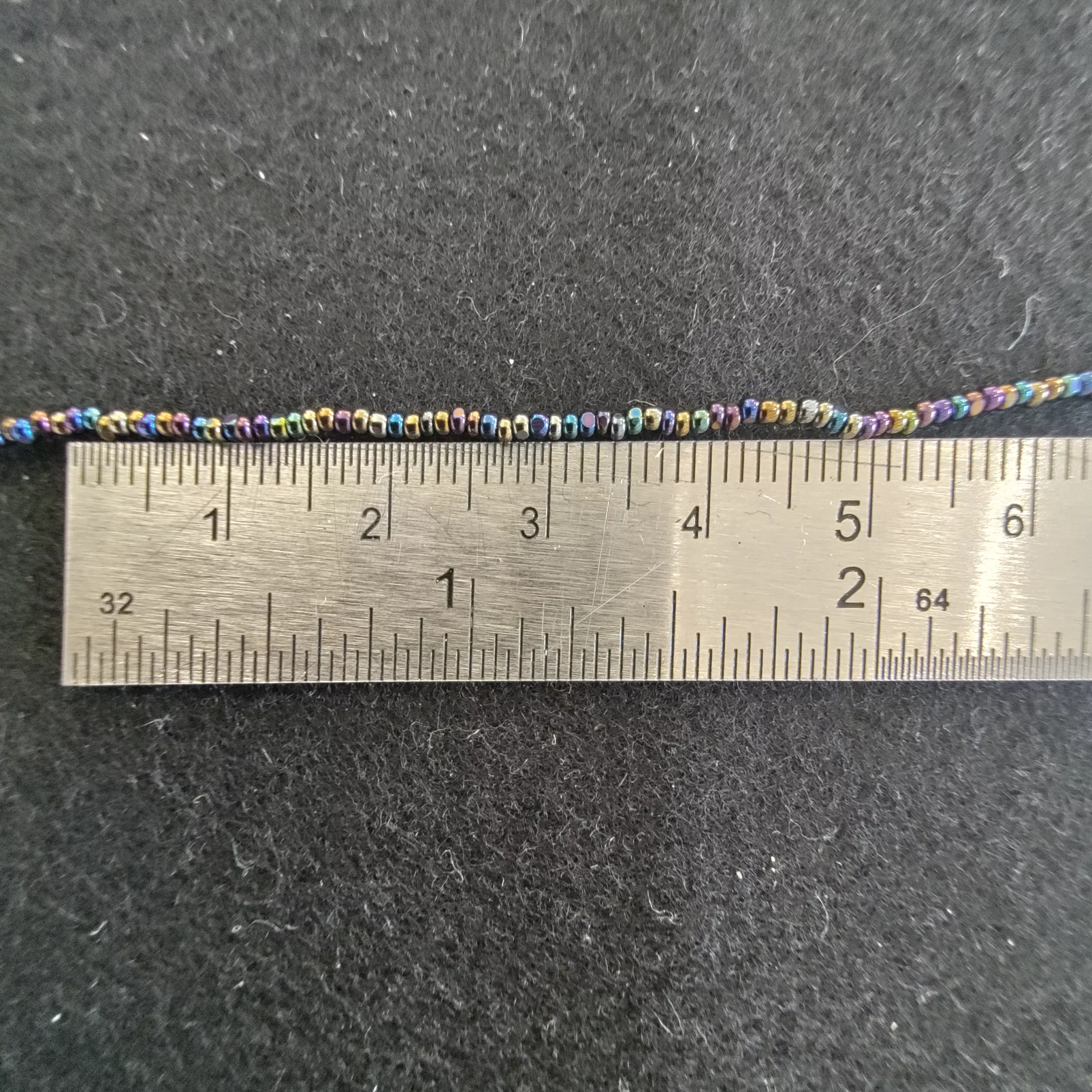 Perles charlotte irisées paon 59205/13