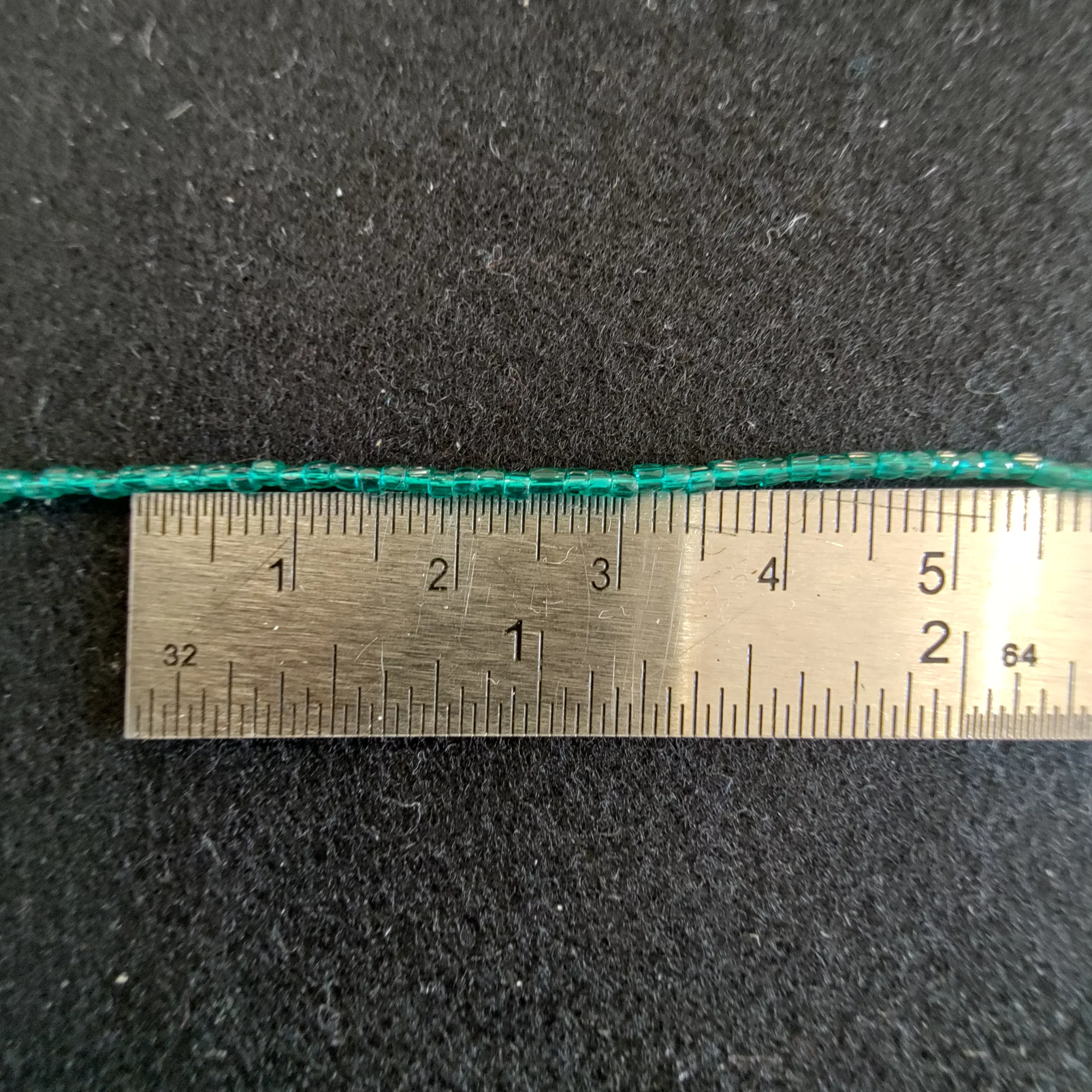 Perles 3 facettes vert translucide 50710/12