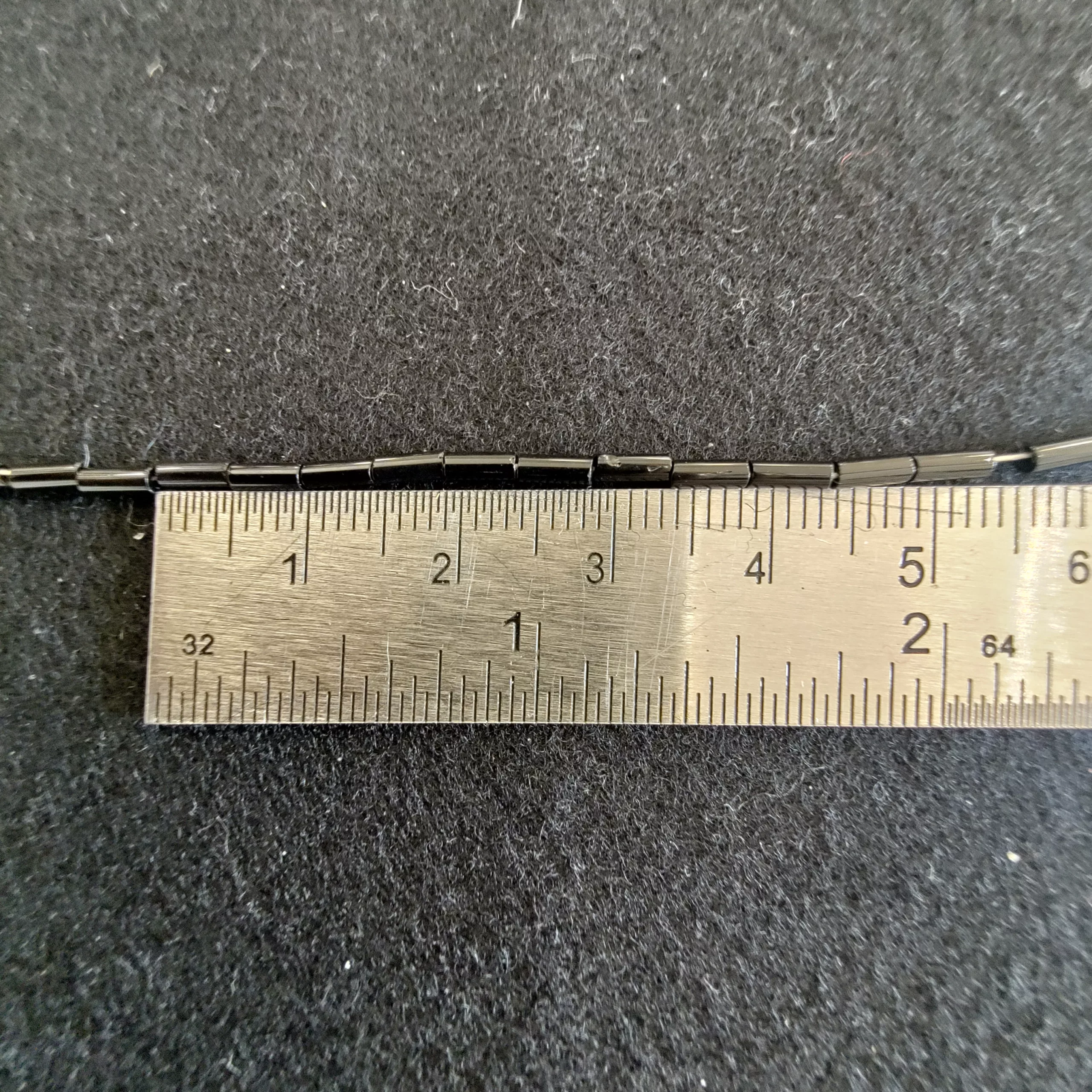 Perles tubes noir 2390/2