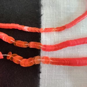 Paillettes orange néon transparent 2357